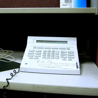 A call-centre telephone console without a handset