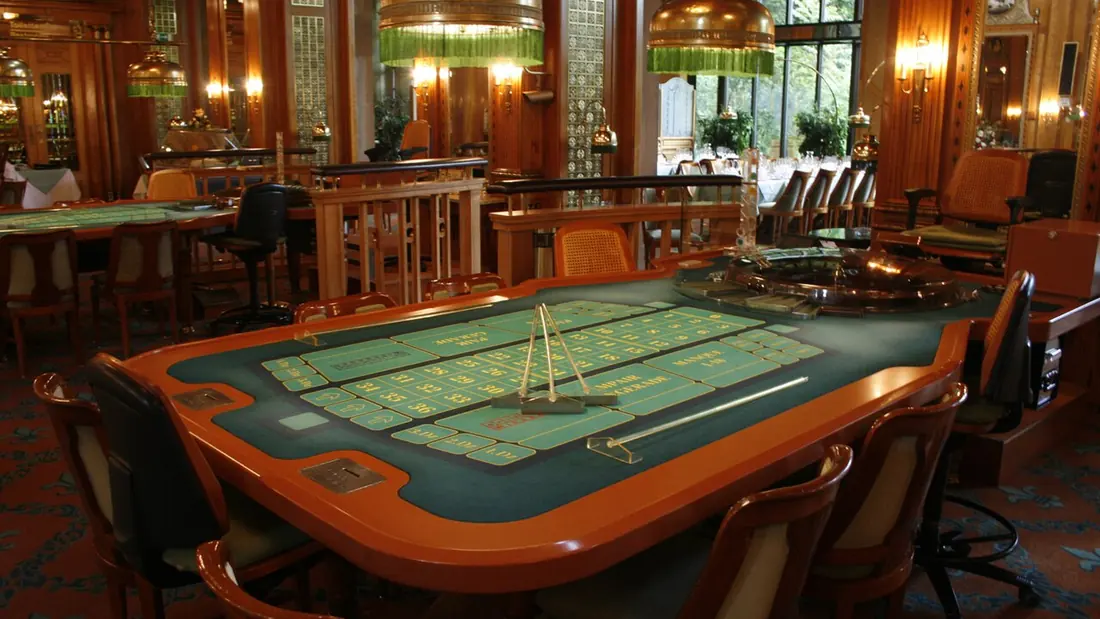 A roulette table with its wheel and layout