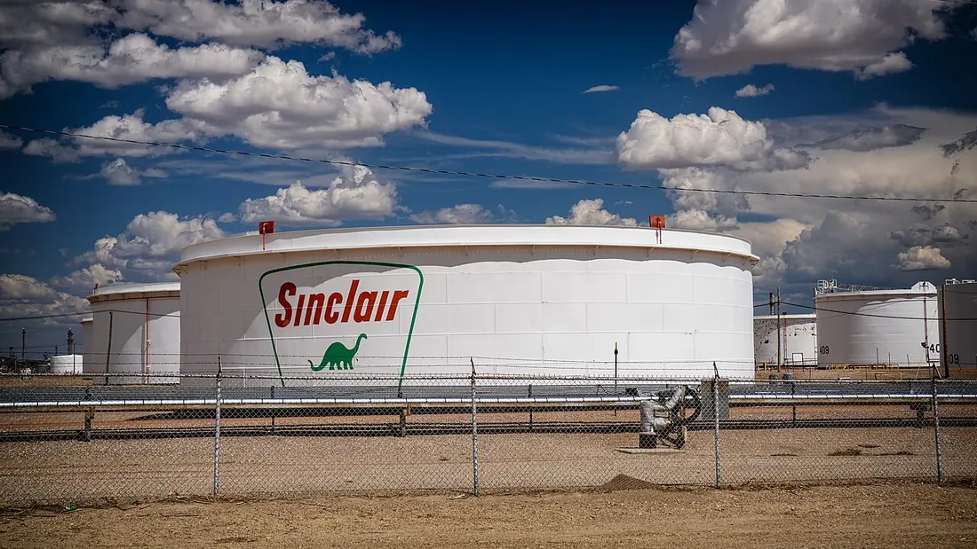 Rows of cylindrical crude oil storage tanks