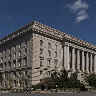A large government office building with a colonnade